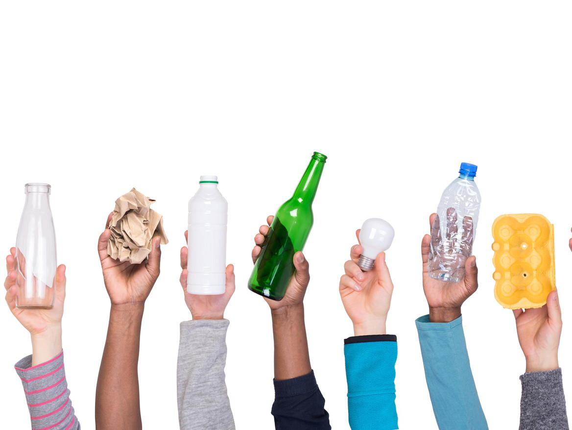 Hands holding up different sorts of waste. Photo: photka - stock.adobe.com